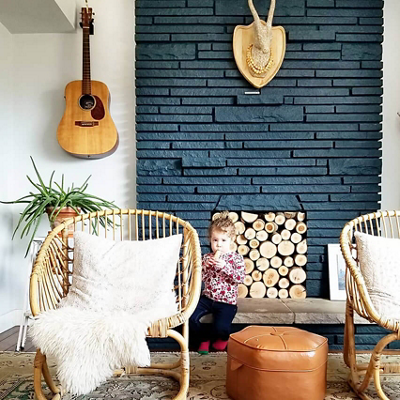 A rustic painted fireplace. S-W featured colors: SW 6237, SW 7661.