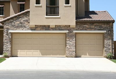 A set of two painted garage doors.