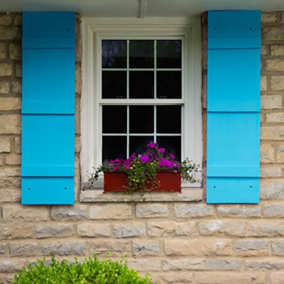 A house with exterior light blue shudders. SW Colors featured: SW 6787
