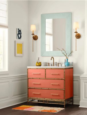 A bathroom with Alabaster SW7008 walls and a vanity painted Rejuvenate SW6620.