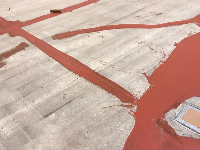 Floor cracking being repaired at a food and beverage facility