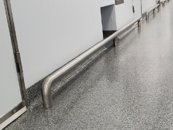 Image of a resin floor with integral cove base