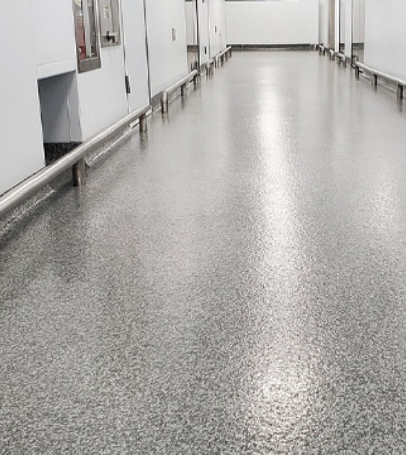 Image of a resin floor with integral cove base