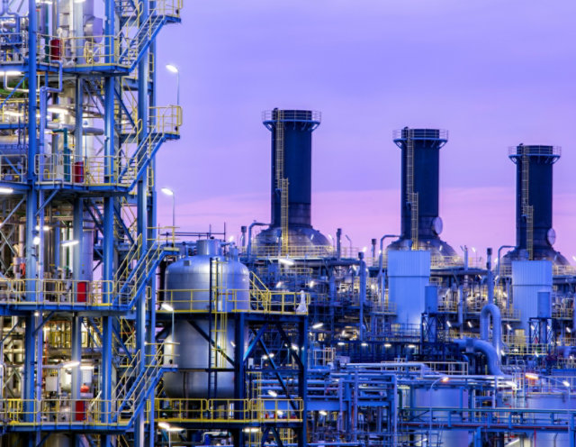OIl refinery at sunset