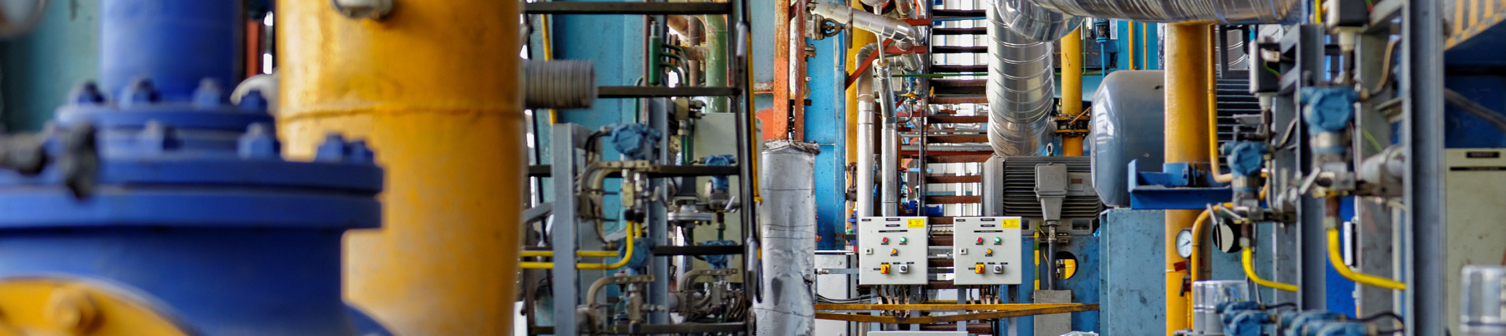 Color-coded  pipes inside a facility.