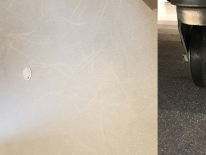 Image of point load damage on floor next to cart wheel