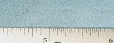 Imprints left in paint due to poor print resistance of the surface.