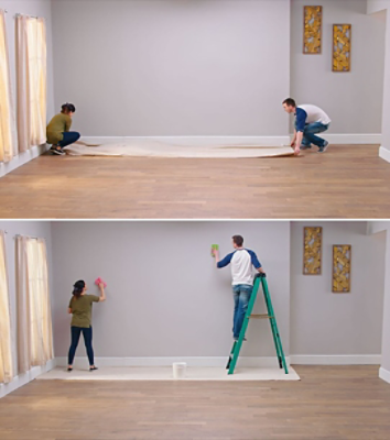 A man and woman preparing to paint a blank wall.