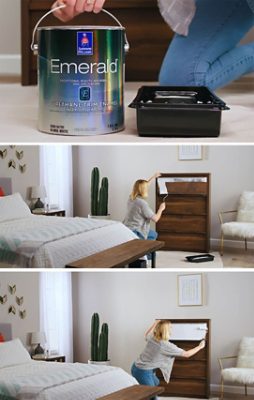 A woman is priming a dresser for paint.