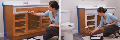 Woman priming bathroom vanity with paint brush and roller.
