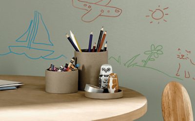 A whiteboard painted wall in a child's playroom.