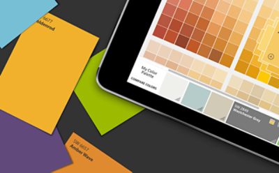 Paint chips and the color visualizer on a tablet.