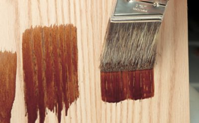 Staining a light piece of wood.