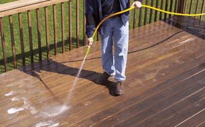 Cleaning a deck before applying new stain.