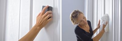 A woman sanding a door surface before painting. 