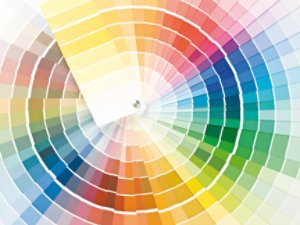 Circular gradient color palette with segmented hues converging at a white center.