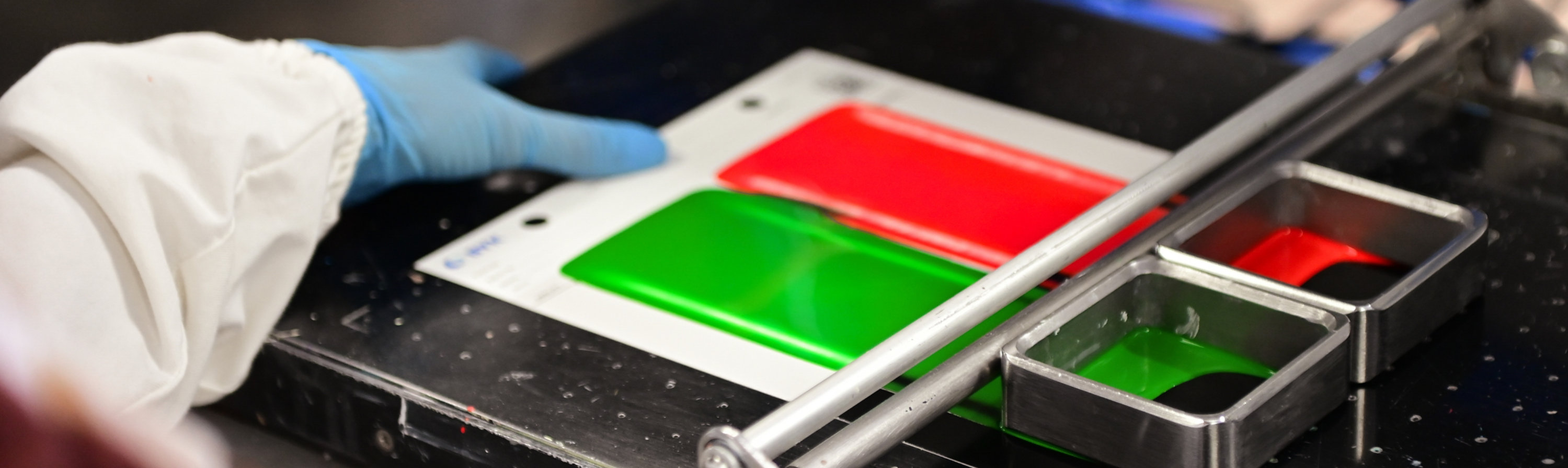 Close-up of color control equipment in use, illustrating Sayerlack’s precision in wood coating quality assurance.