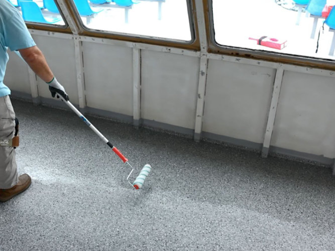 squeegeeing on ship deck