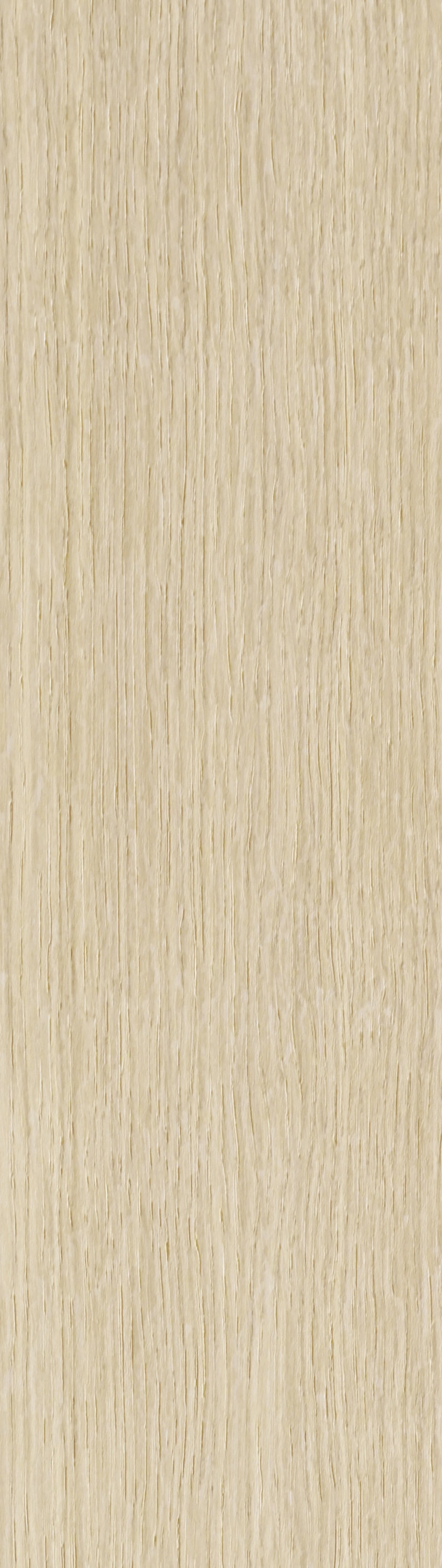 A cuddly teddy bear nestled on a cozy blanket and pillows.