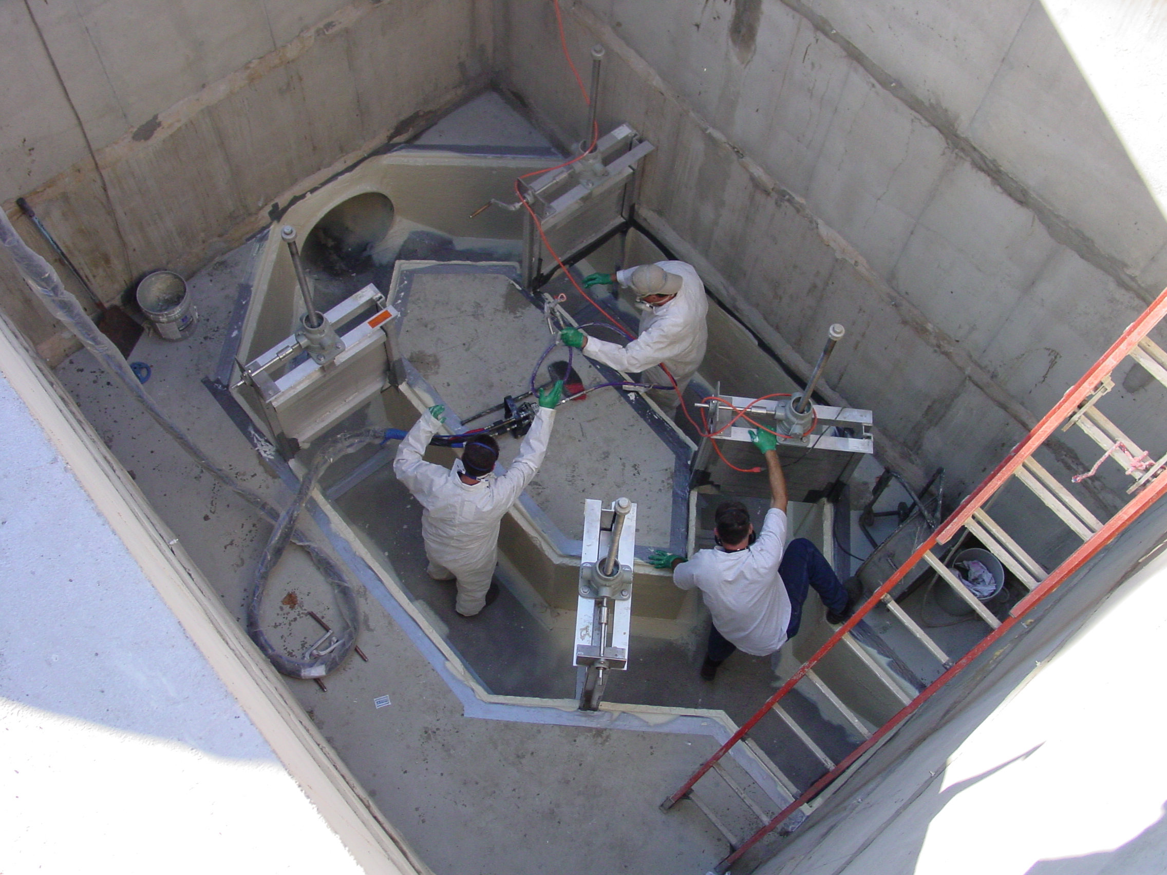 Coating application in sewer manhole