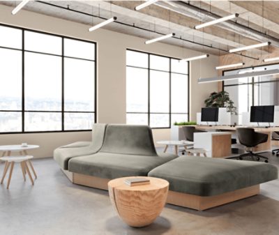 An open seating area in a commercial space with walls painted Shiitake SW 9173.