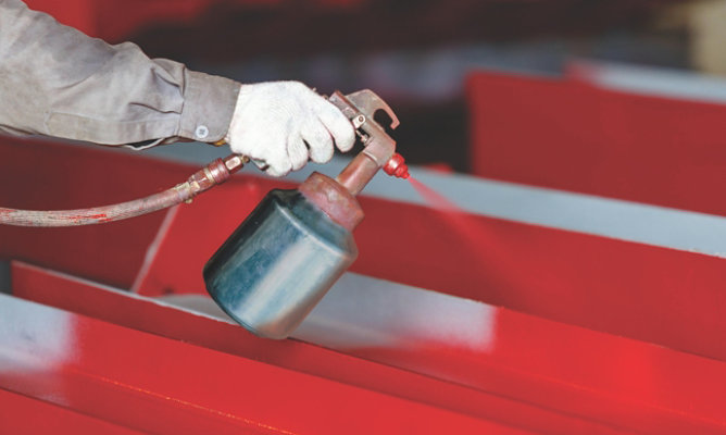 Spraying liquid coatings