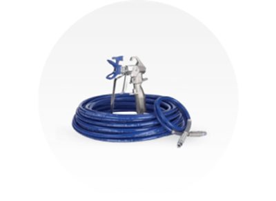 A paint sprayer with a coiled up blue hose.