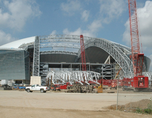a steel stadium being constructed
