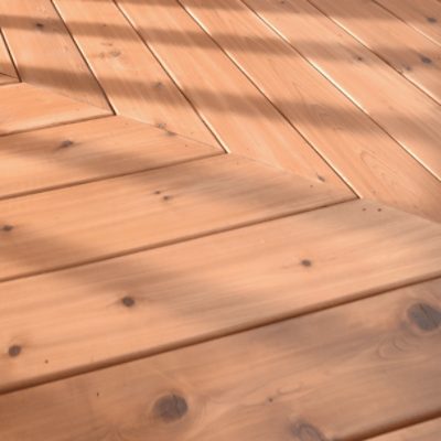 Up close of a stained wood deck.