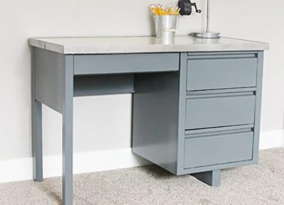 A newly painted pewter desk S-W color featured: SW 2848 Roycroft.