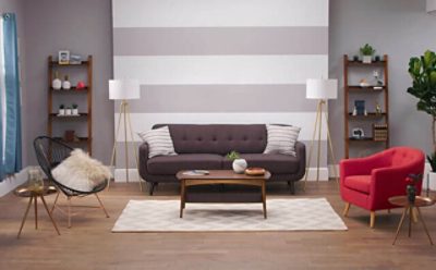 A striped patterned wall with gray hues.