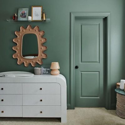 A green painted bedroom with green doors and trim. S-W color featured: SW 6207.