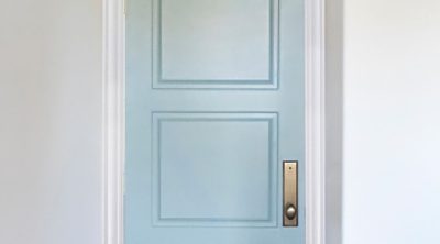 A green door with a second coat of paint. S-W color featured: SW  6213 Halycon Green.