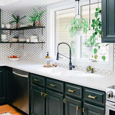 A kitchen with forest green cabinets. S-W featured color: SW 6216 Jasper