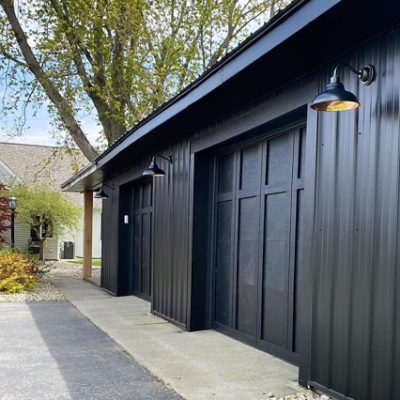 A set of exterior home garage doors. S-W color featured: 6258.