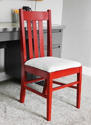 An upcycled wooden chair S-W color featured: SW 6328 Fireweed.