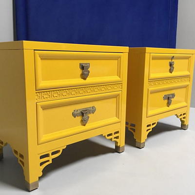 A set of bright yellow end tables with drawers. S-W color featured: SW 6903 Cheerful.