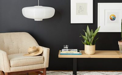 An accented wall with matte black paint. SW color featured: SW 6991 Black Magic.