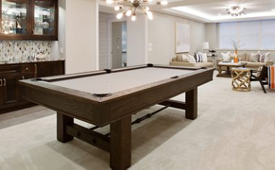 A basement recreational room painted Snowbound.