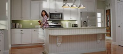 A modern painted kitchen with light cabinets. SW colors featured: SW 7632 Modern Gray.