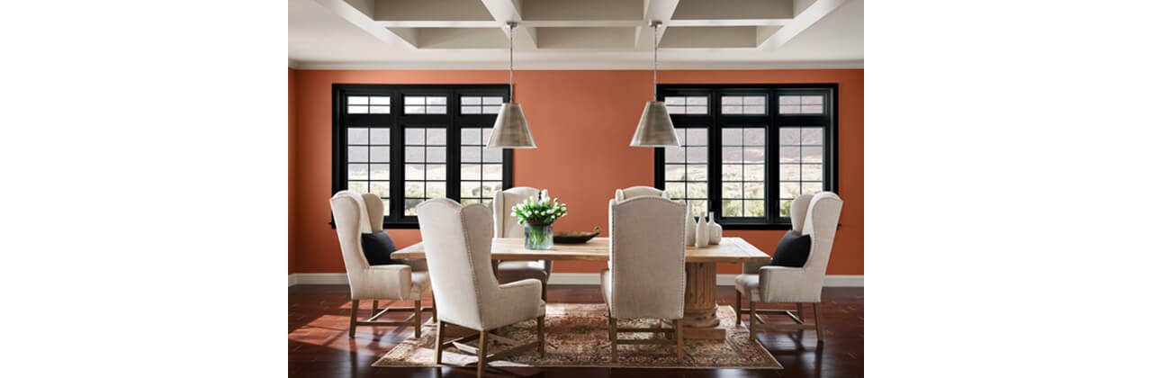 Dining room painted Cavern Clay.
