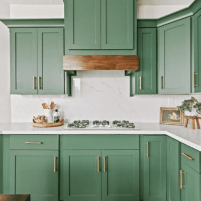 A kitchen with kale green cabinets sw 6460 and brass handles by @appleandwren.