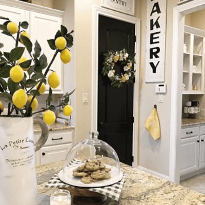 A bright kitchen painted in kilim beige sw 6106 by @blessedonbluefinch.