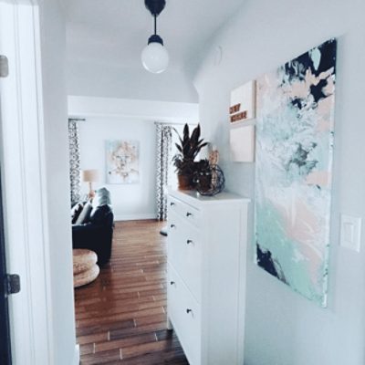 A home hallway painted in reflection sw 7661 by @charcoalandteak.