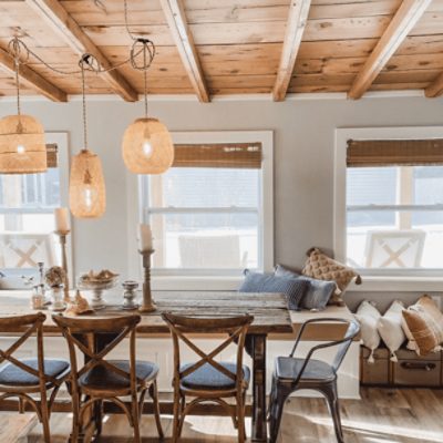 A dining area painted in repose gray SW 7015 by @graycloverhome.