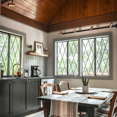 Kitchen painted in Heron Plume SW 6070 by @rootedbydesign_co.