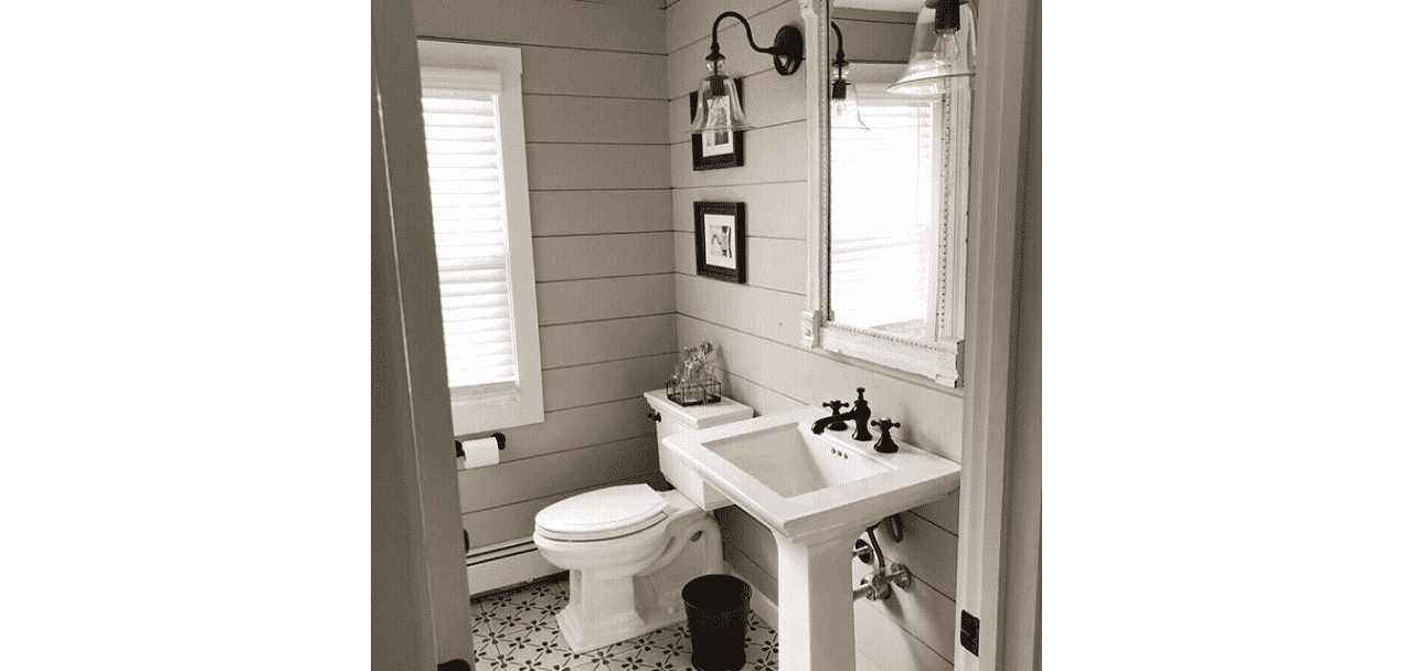 Bathroom painted in Anew Gray SW 7030 by @country_dog_homes.