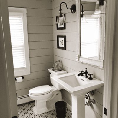 Bathroom painted in Anew Gray SW 7030 by @country_dog_homes.