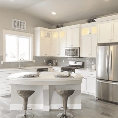Kitchen painted in Amazing Gray SW 7044 by @habitualdesigner.