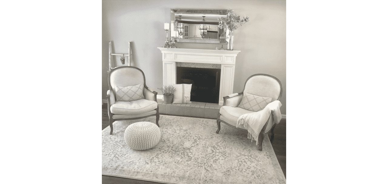 Living room painted in Anew Gray SW 7030 by @happilyhutch.